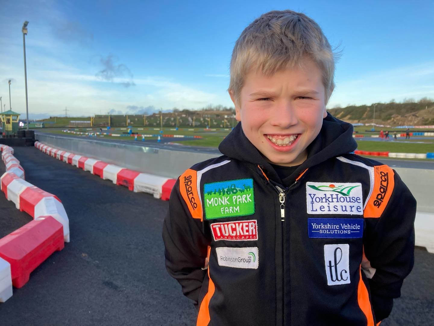 Young karting driver Stanley Clark is sponsored by Monk Park Farm