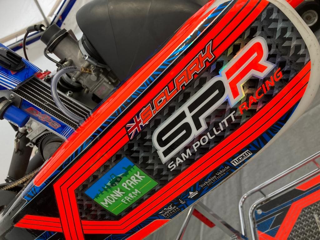 The Monk Park Farm logo on the kart