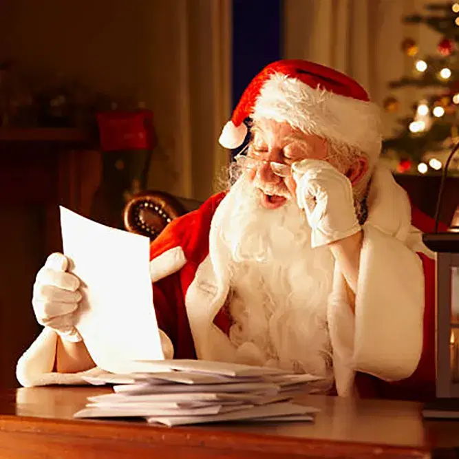 Santa reading children’s letters at Monk Park Farm Christmas event